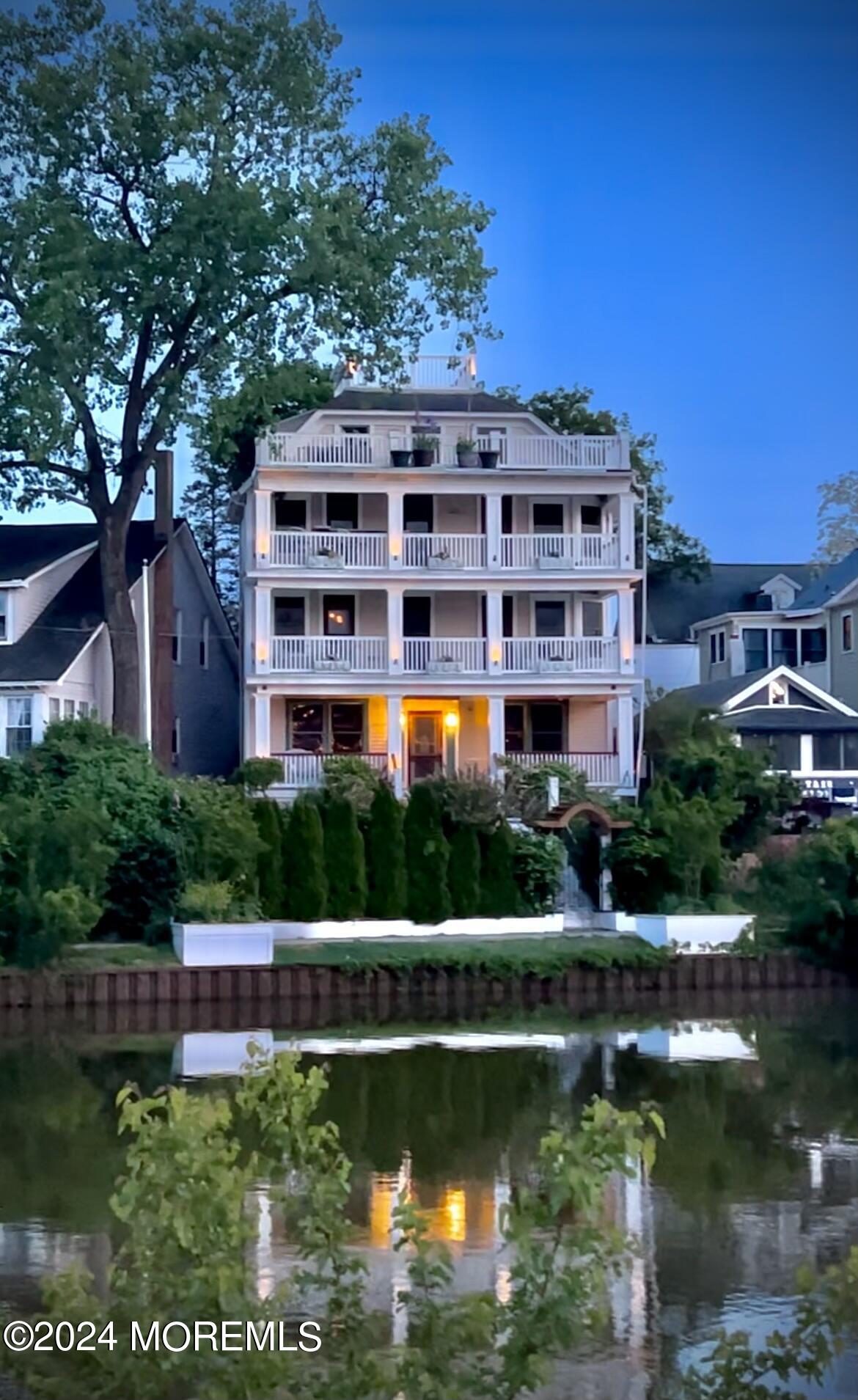 a view of a large building with a lake view