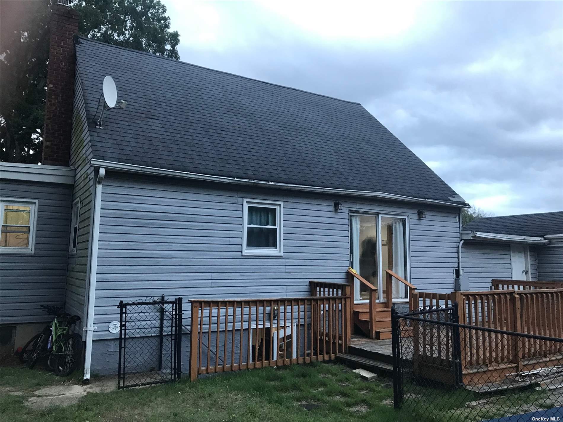 a front view of a house having yard