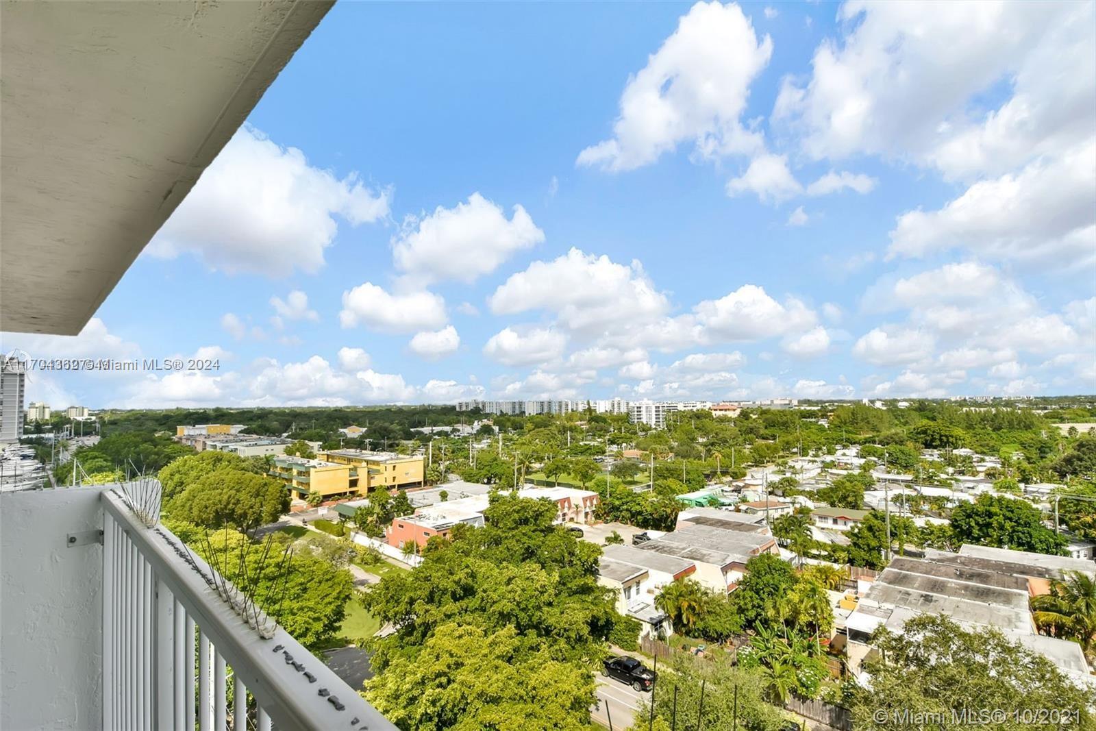 a view of a city from a balcony