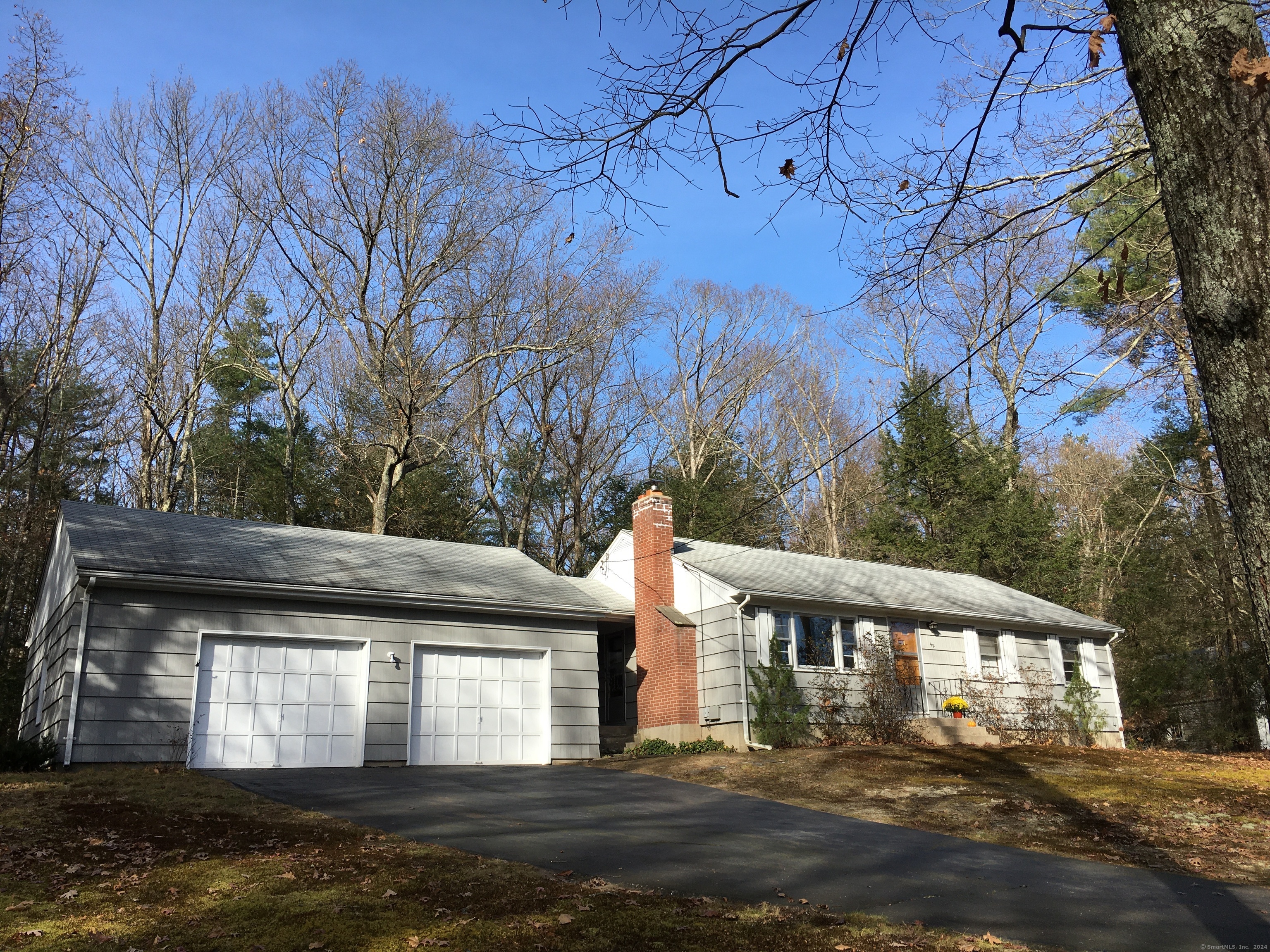 Welcome to 42 Fernwood Drive in bucolic Simsbury