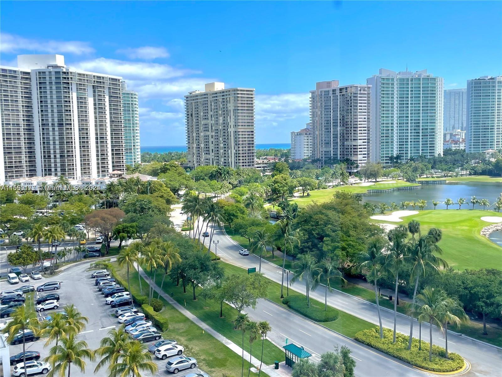 a view of a city with tall buildings