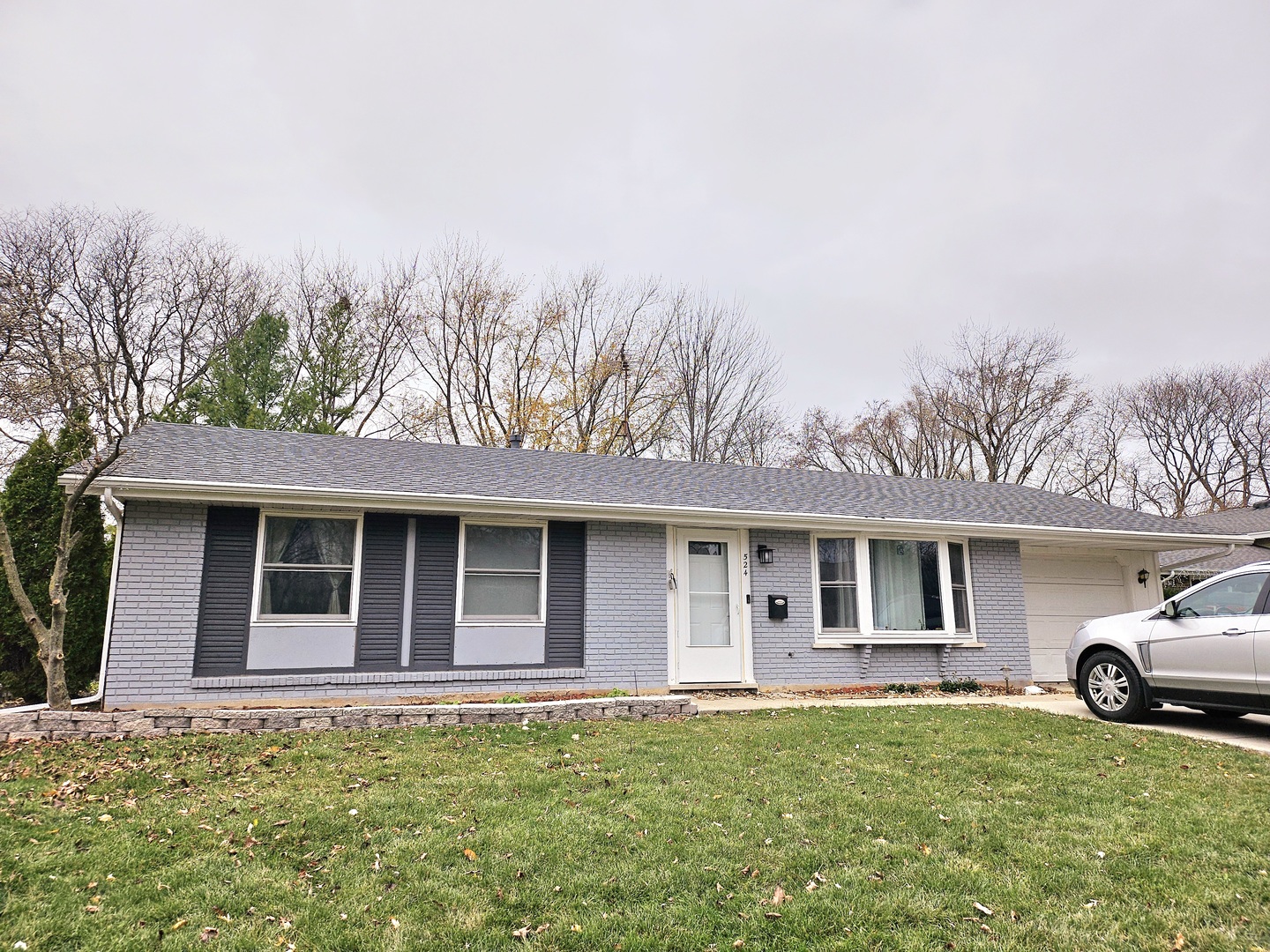 front view of a house with a yard