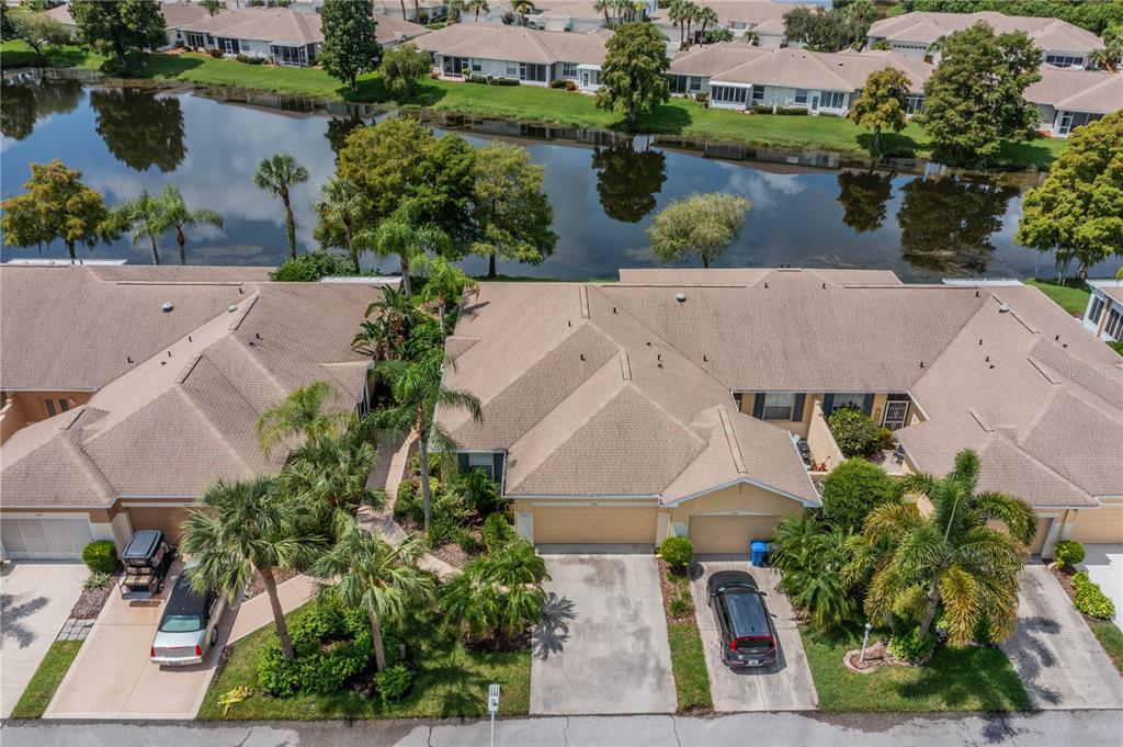 an aerial view of a house with a lake view