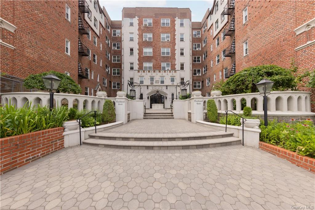 a view of a building with a garden