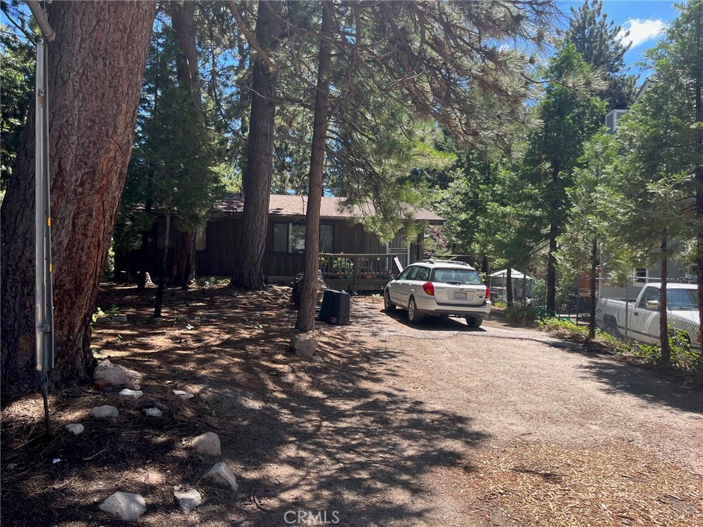 a view of a house with a back yard