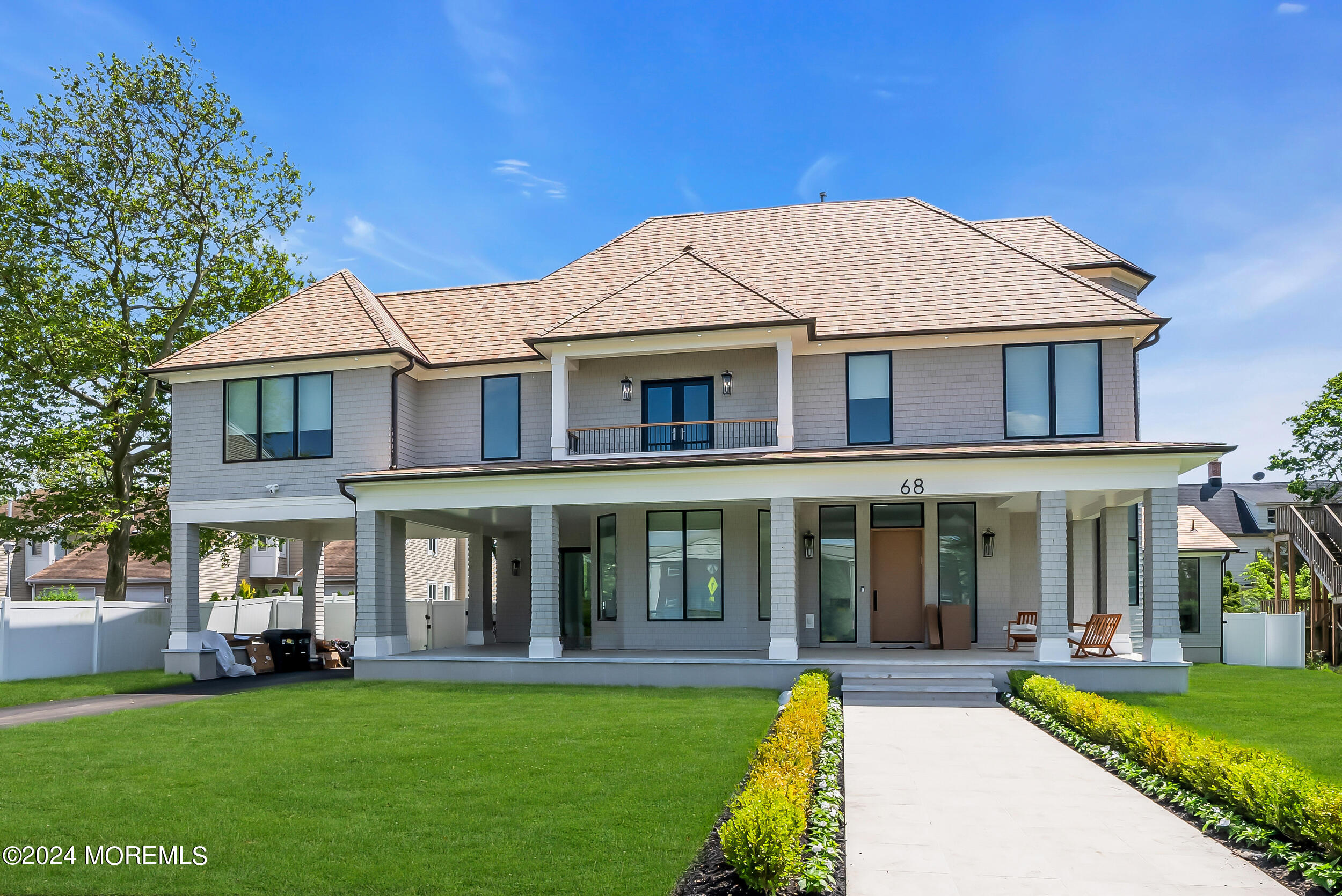 front view of a house with a yard