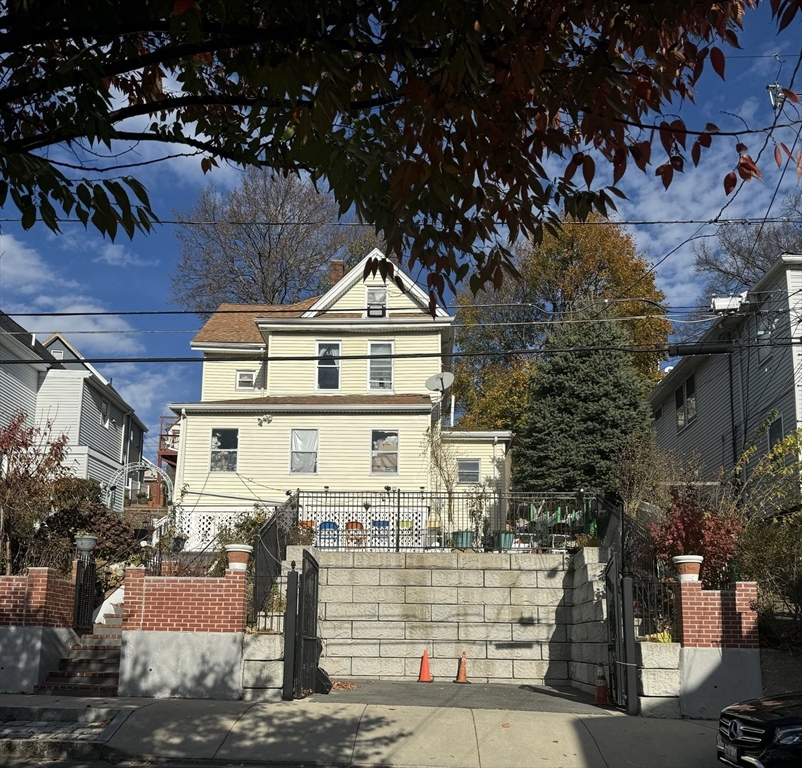 a front view of a house with street