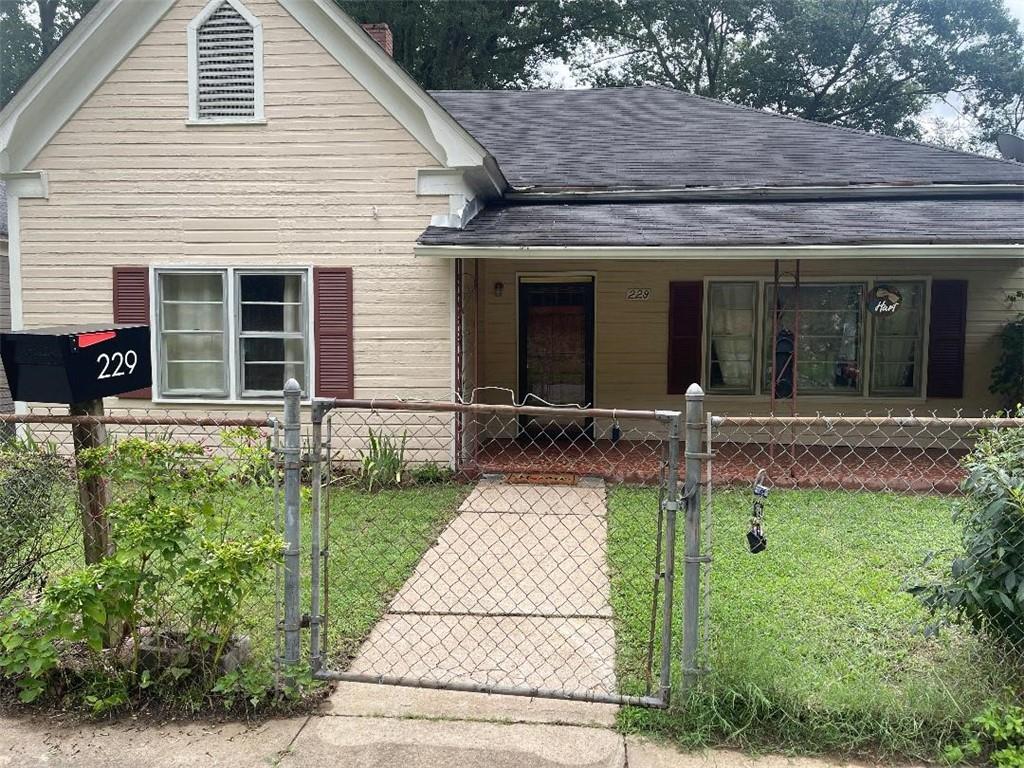 a front view of house with yard