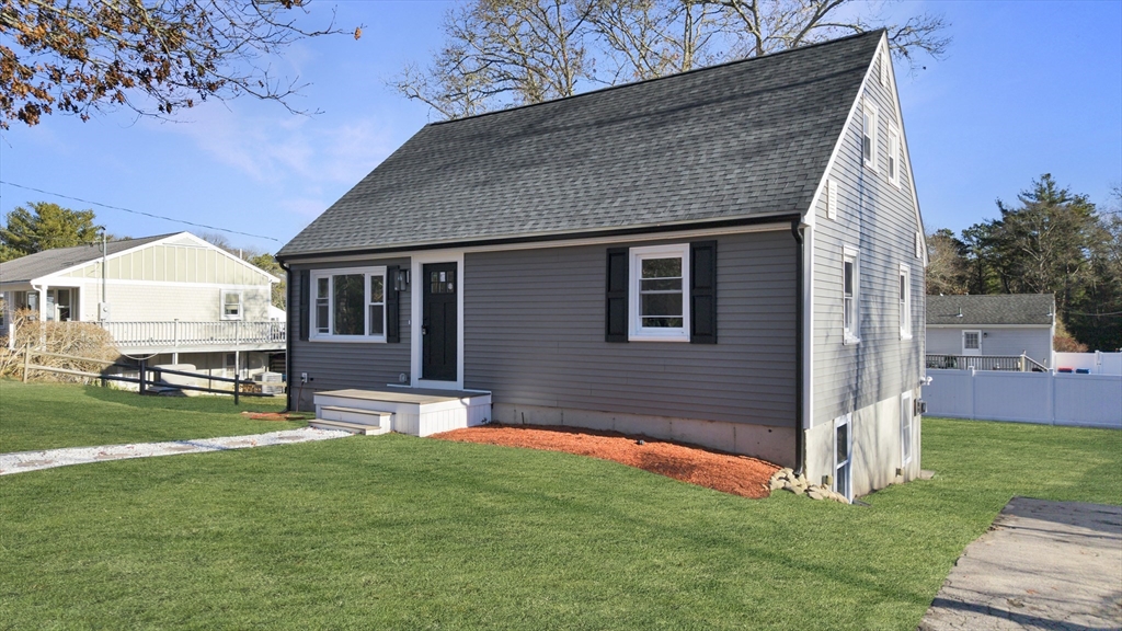 a front view of house with yard