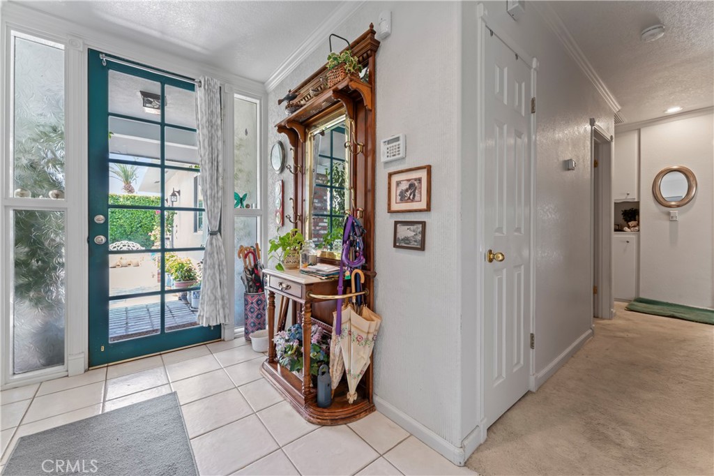 a view of an entryway door front of a house