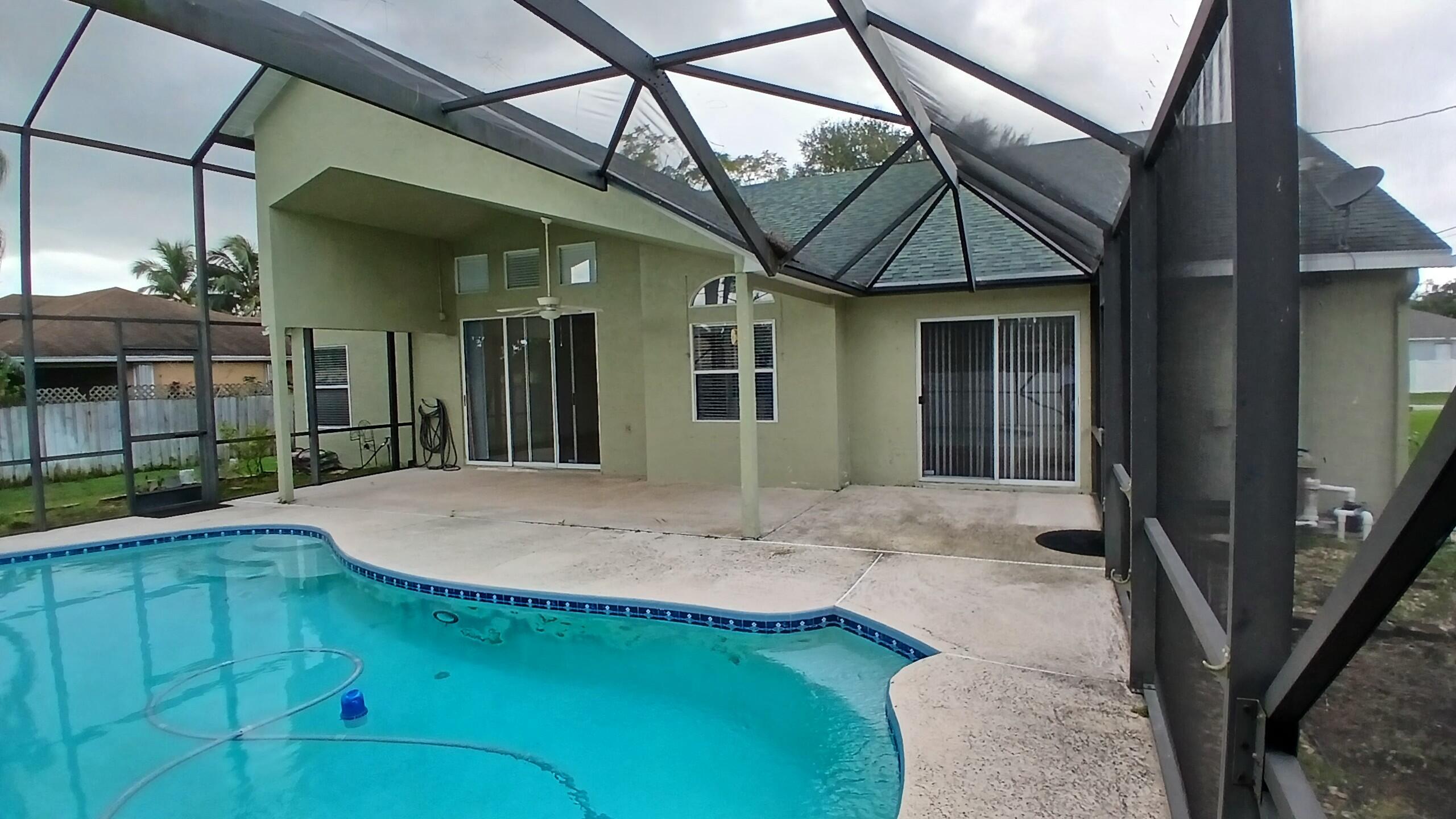 a view of a house with a tub and porch