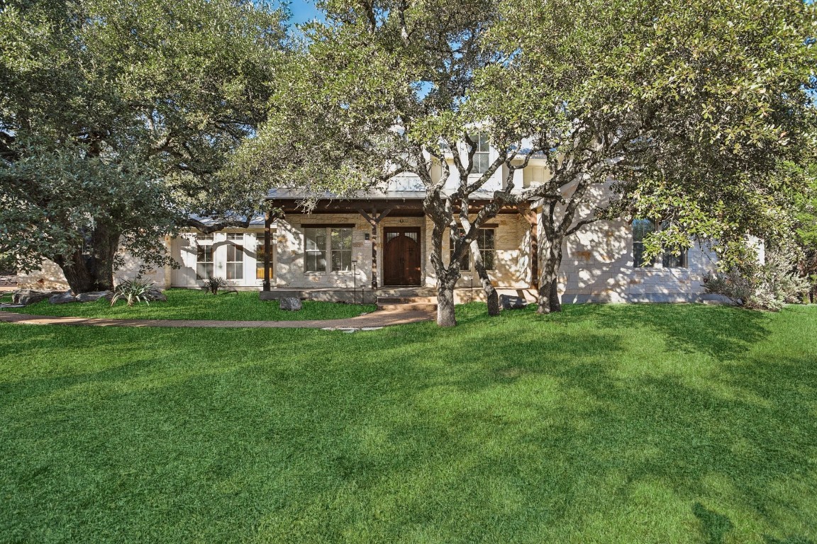 a front view of house with yard