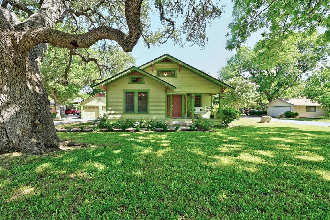 a house view with a garden space