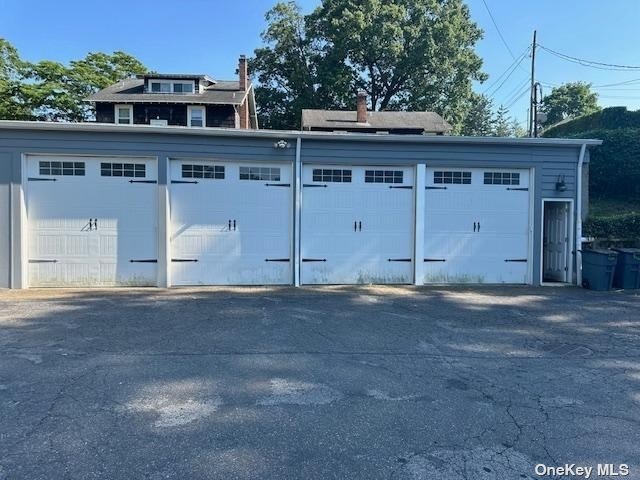 a view of a house with a garage