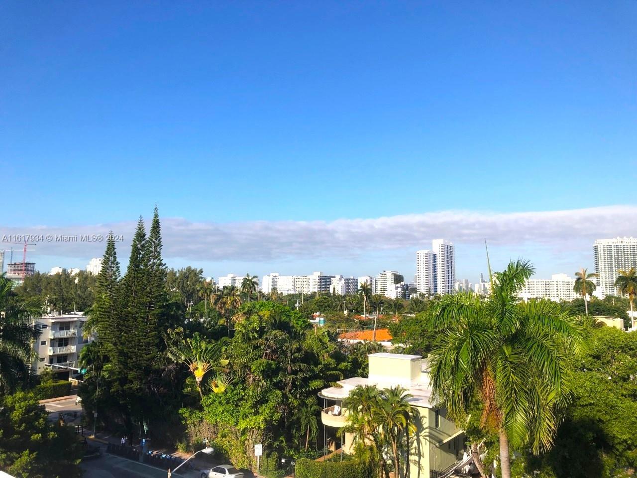 a view of a city with tall buildings