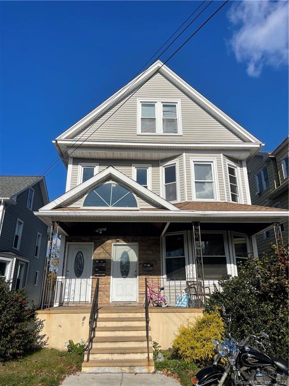 a front view of a house with swimming pool