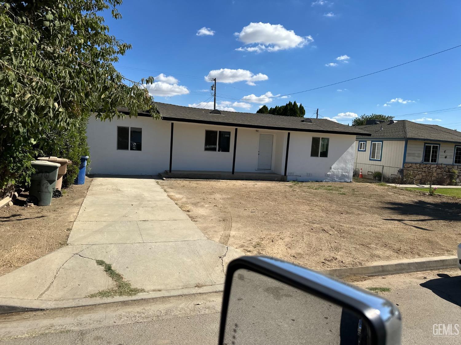 a view of a backyard of a house