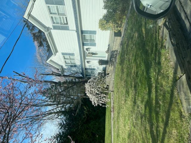 View of front of home with a front yard