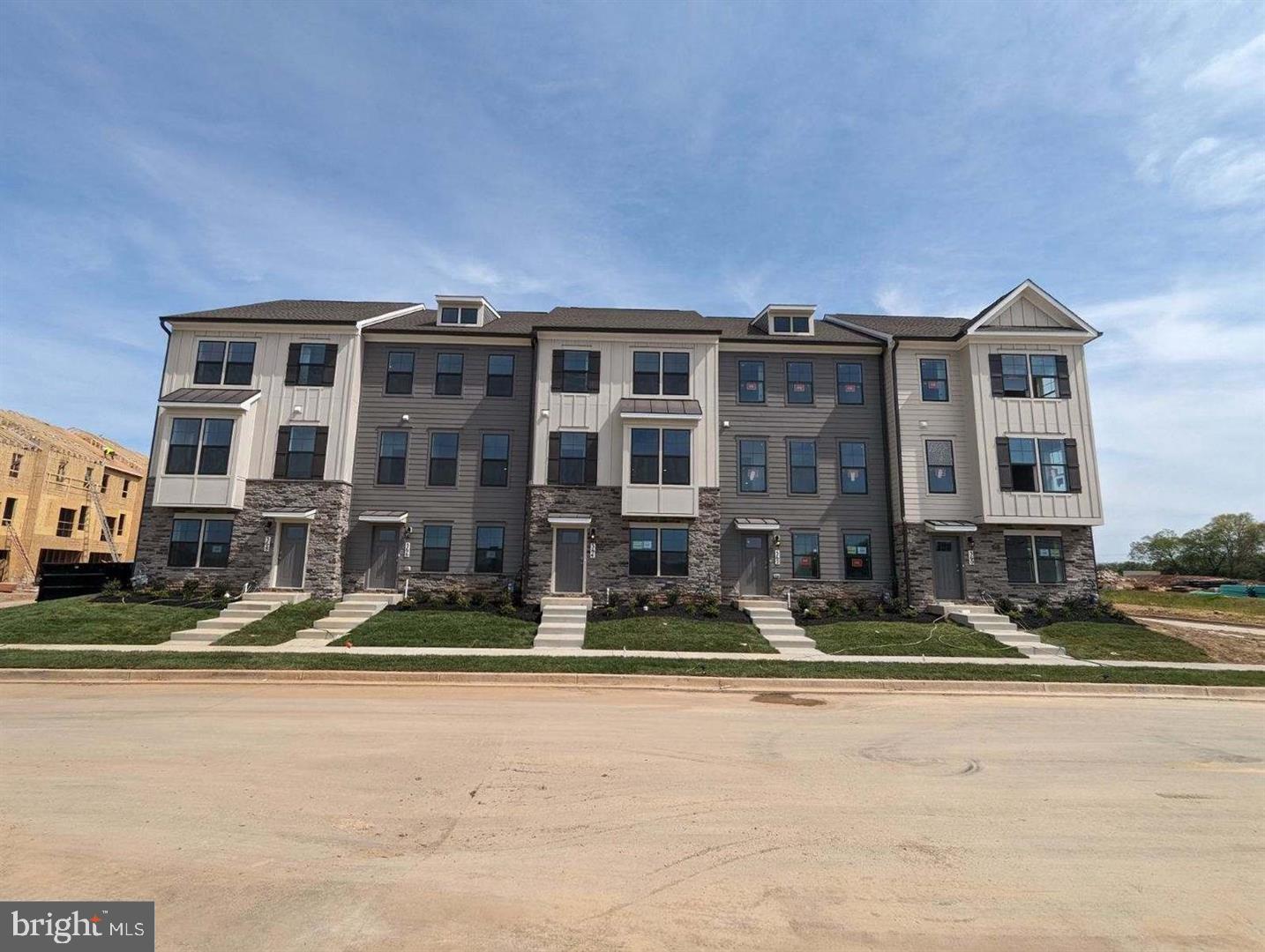 a front view of a building with street view