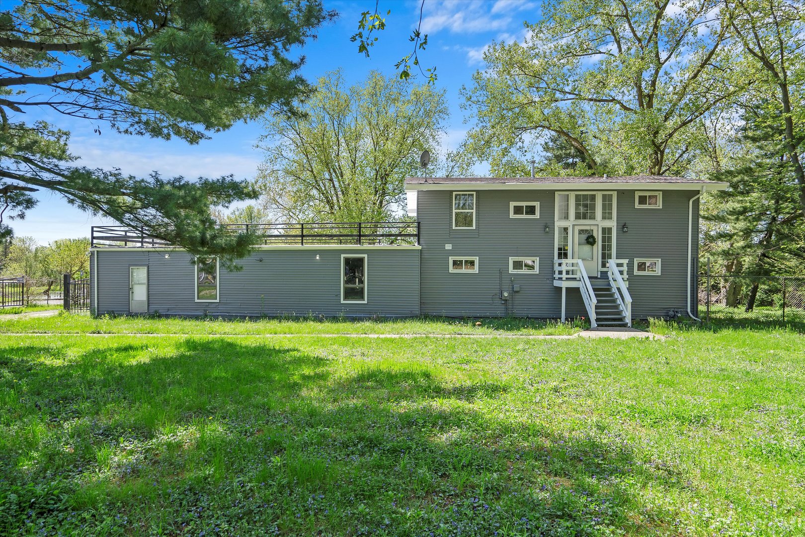 front view of a house with a yard