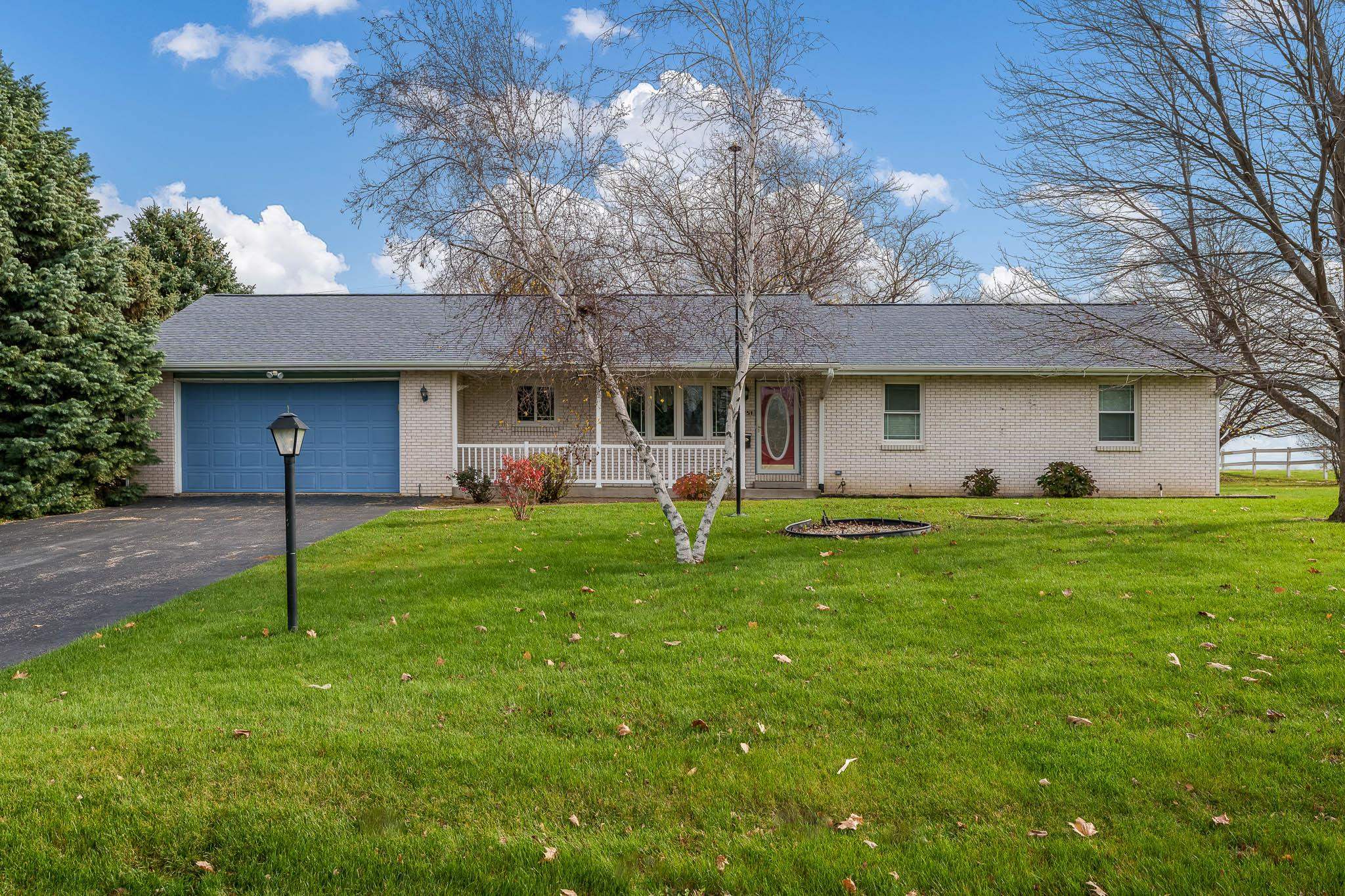 a front view of house with yard