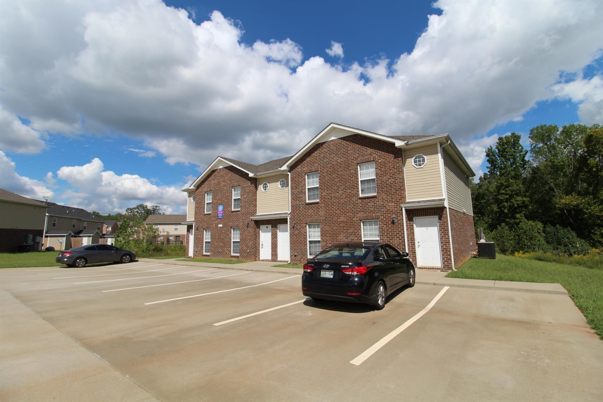 a car parked in front of a house