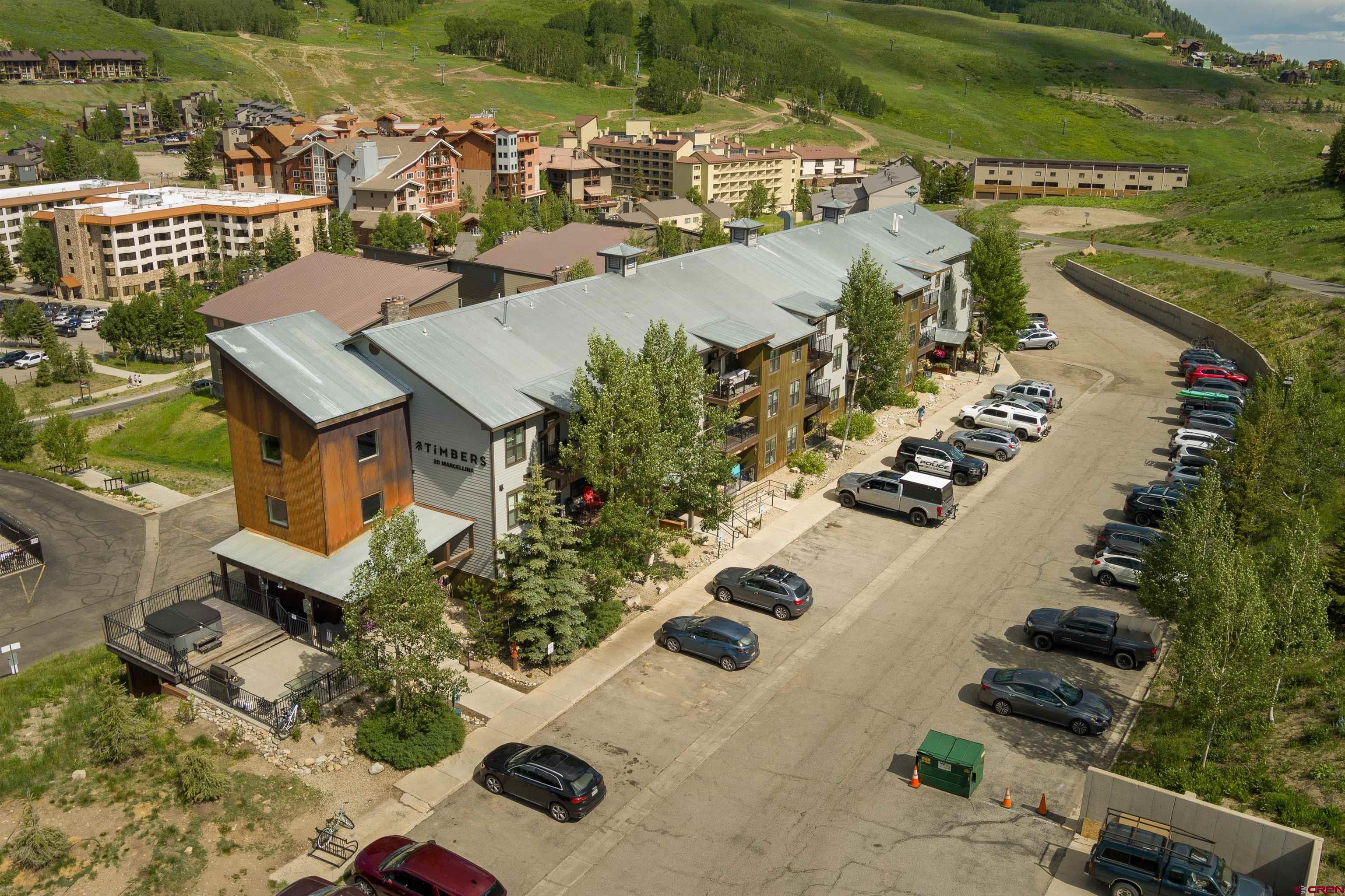 an aerial view of a house with outdoor space