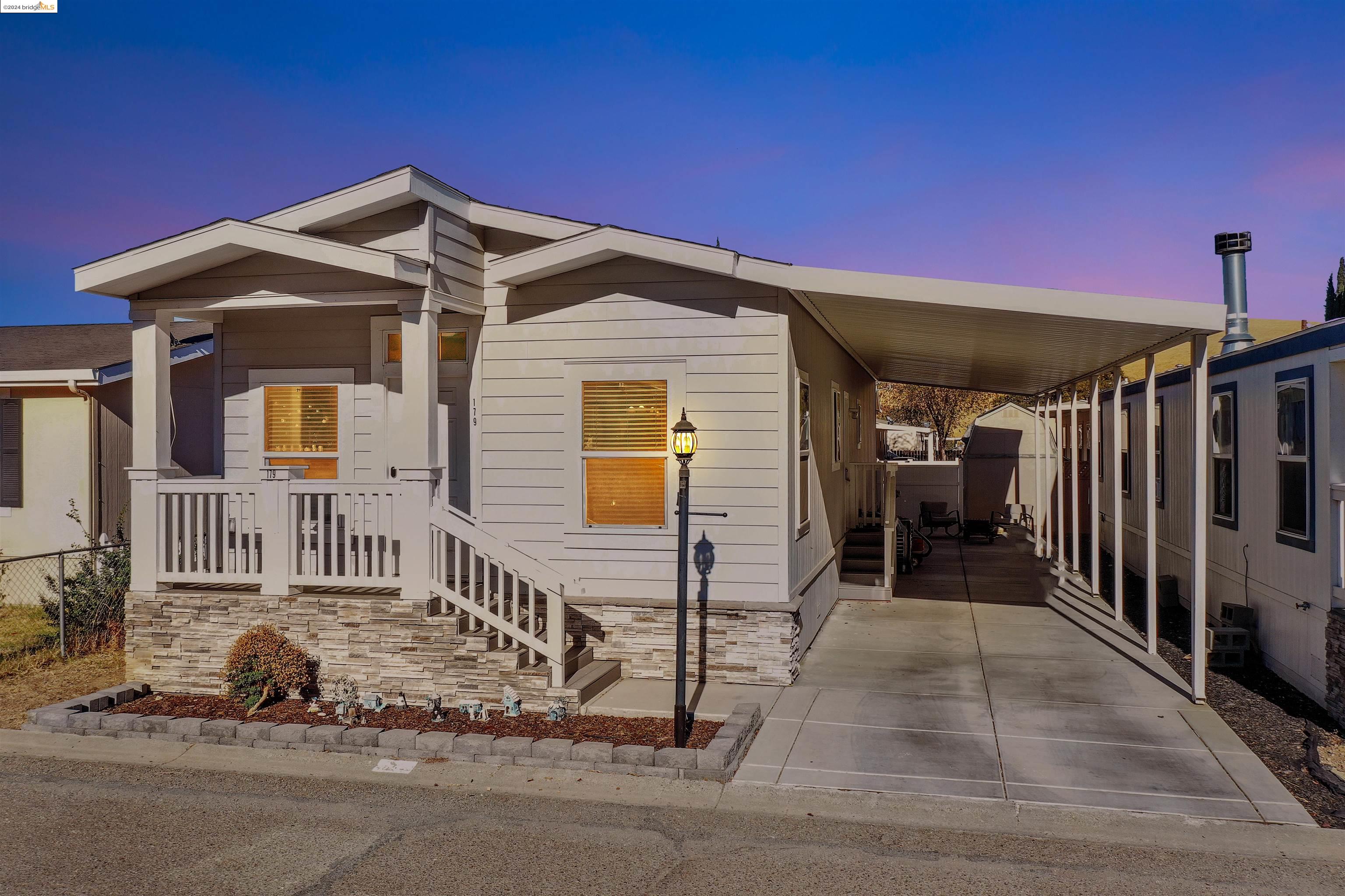 a front view of a house with garage