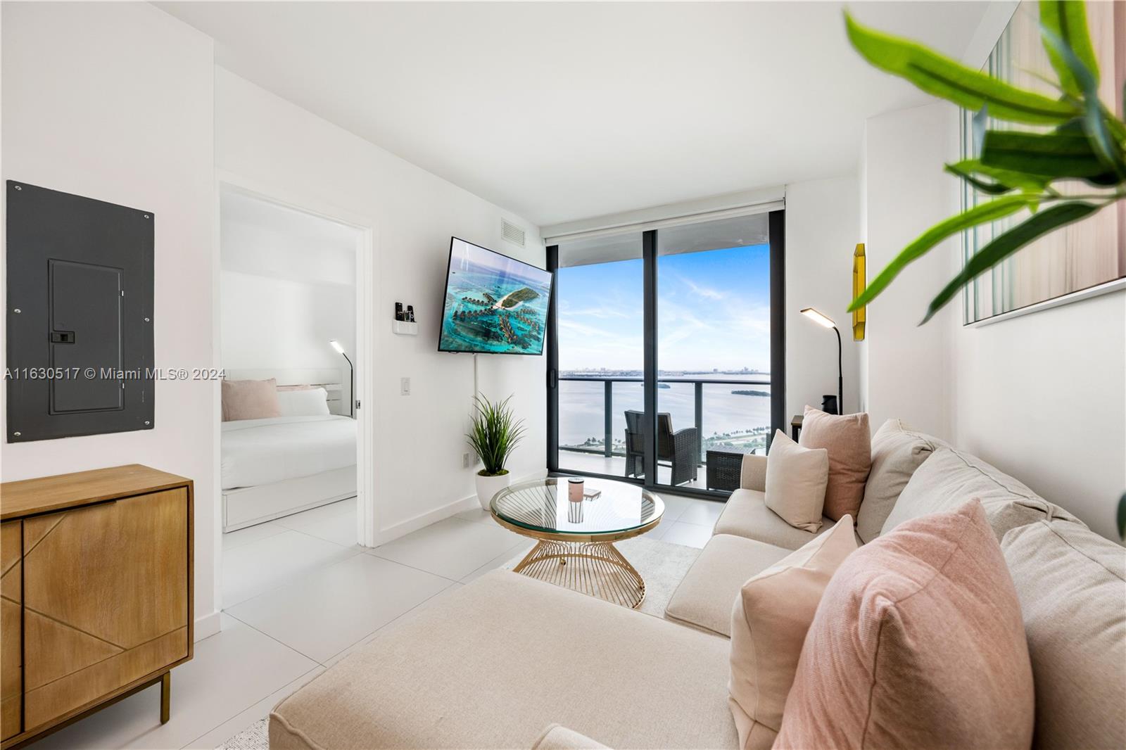 a living room with furniture and a white area