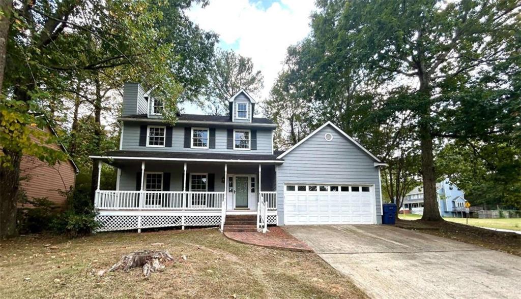 a house with trees in front of it