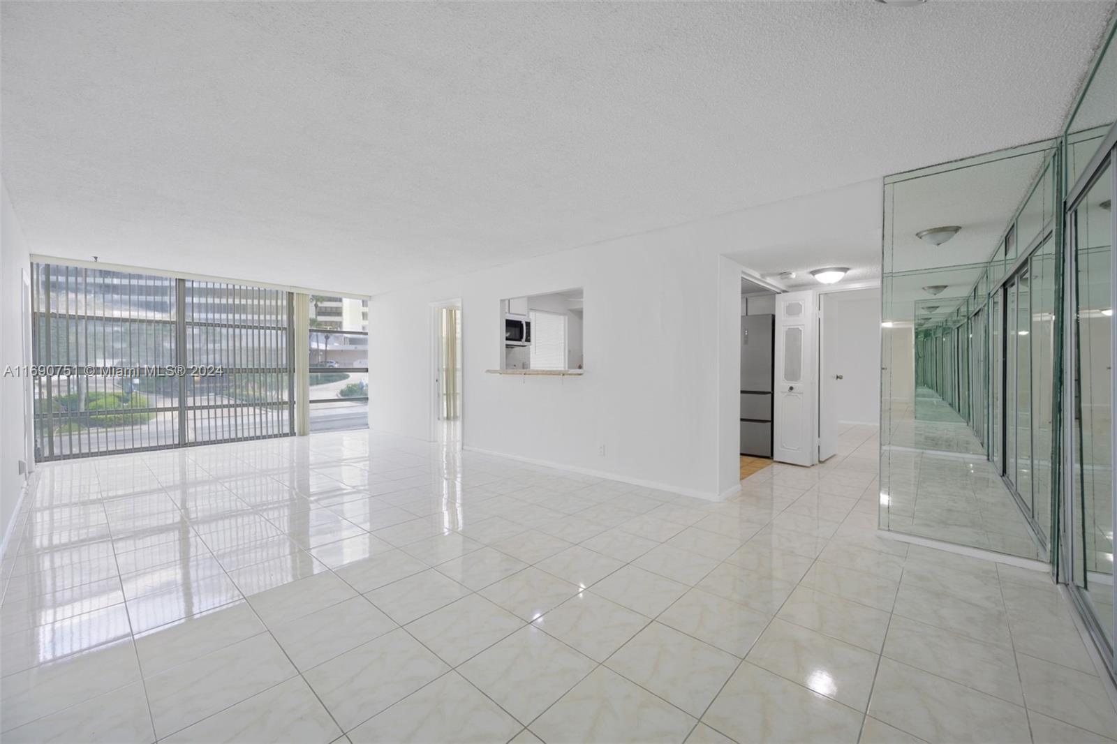 a view of an empty room and window