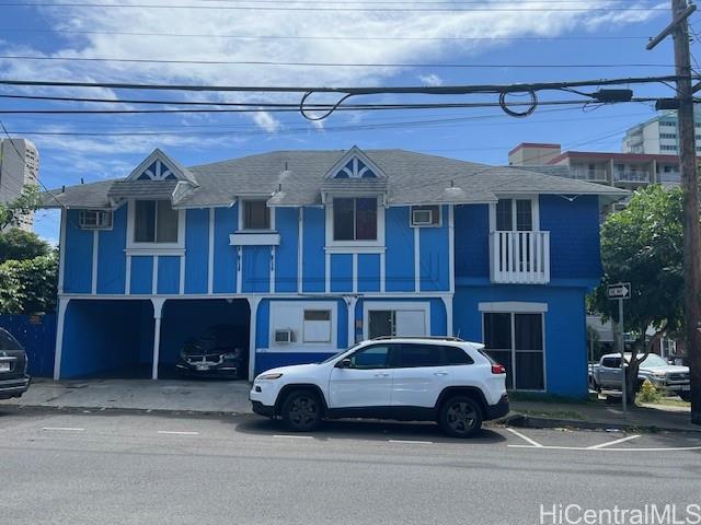 a car parked in front of a building