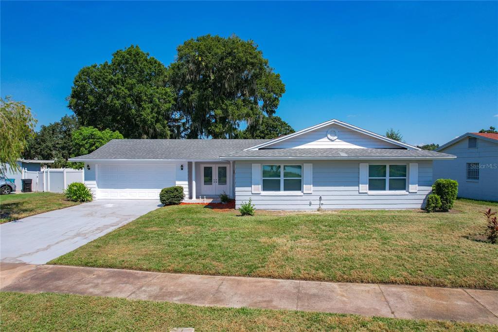 front view of a house with a yard