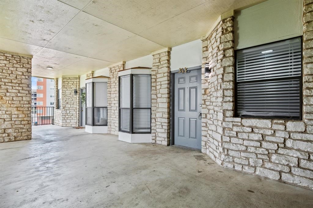 a view of empty room with windows