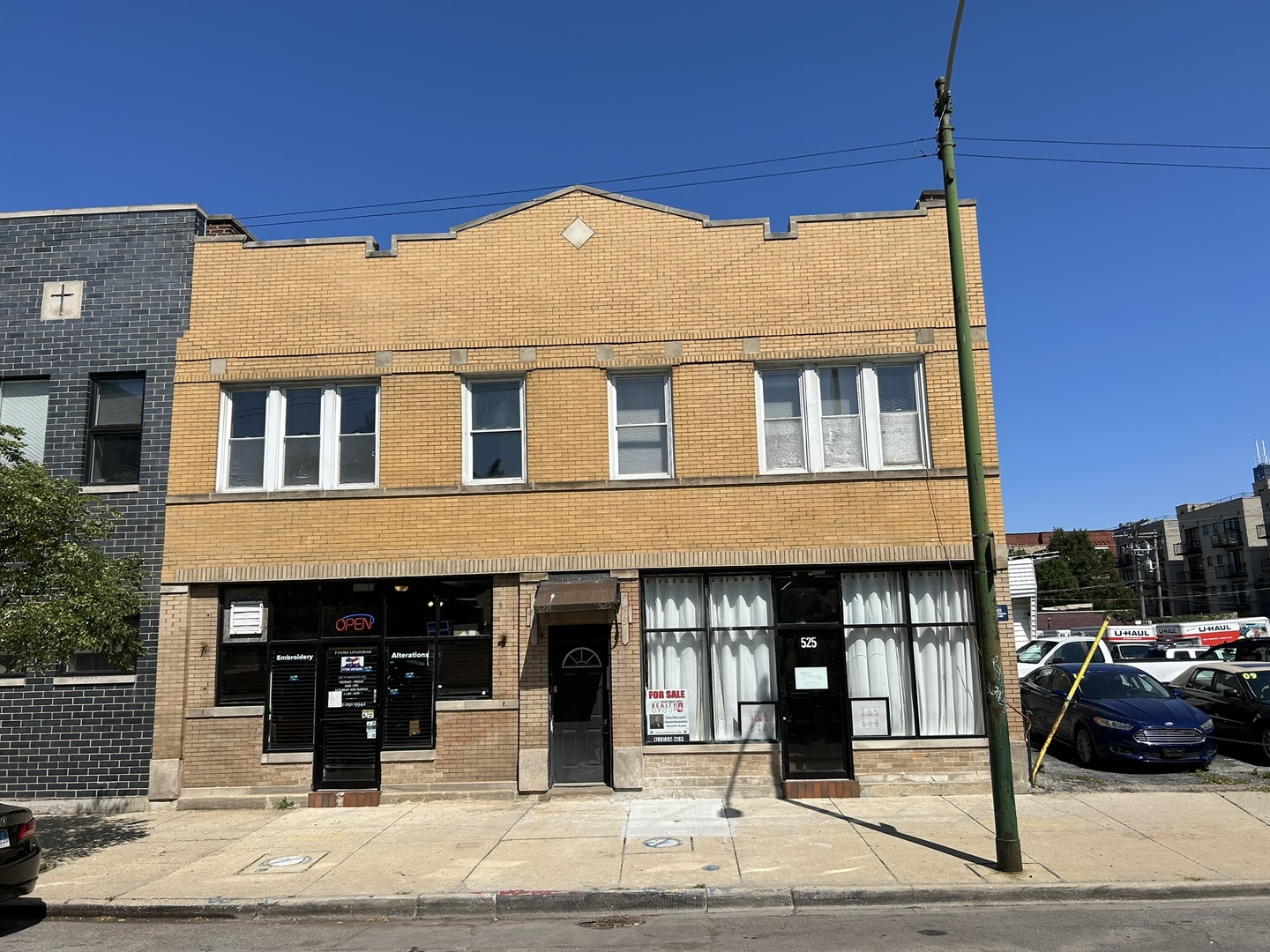 a front view of a building with street