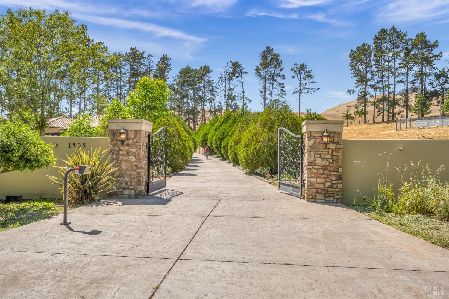 a view of a pathway with a building in the background