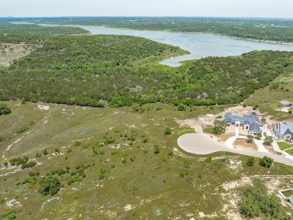 a view of a lake from a yard