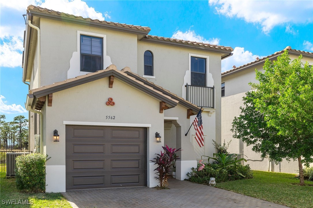 a view of a house with a garage