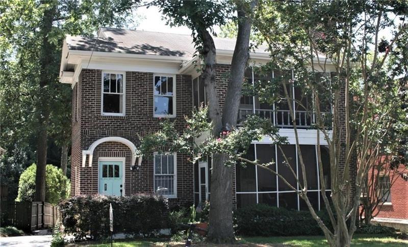 a front view of a house having yard