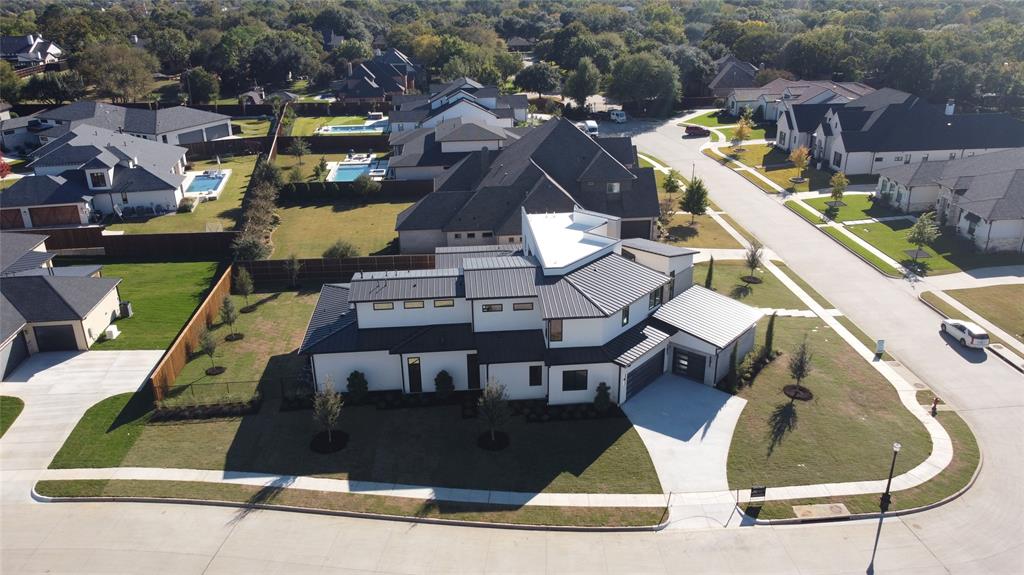 an aerial view of a highlighted house