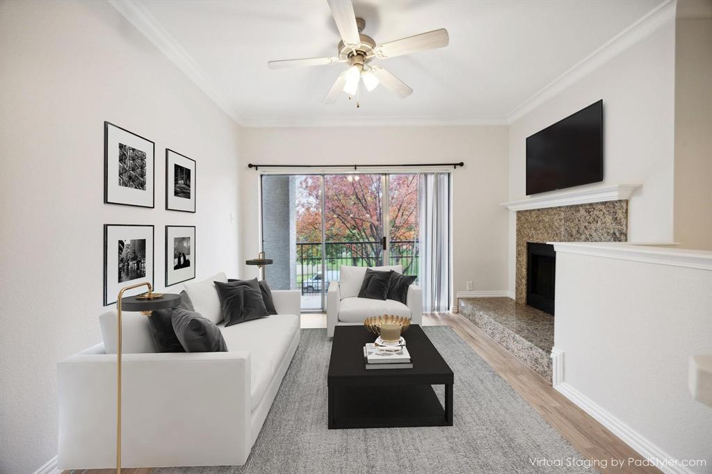 a living room with furniture fireplace and a flat screen tv