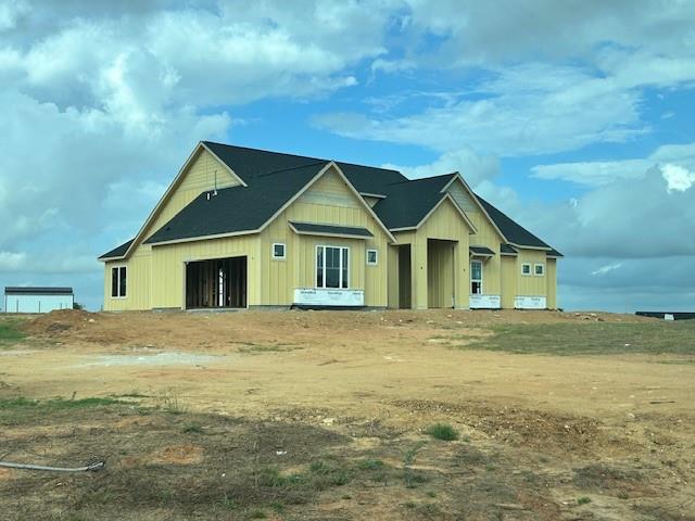 Side view of home with garage