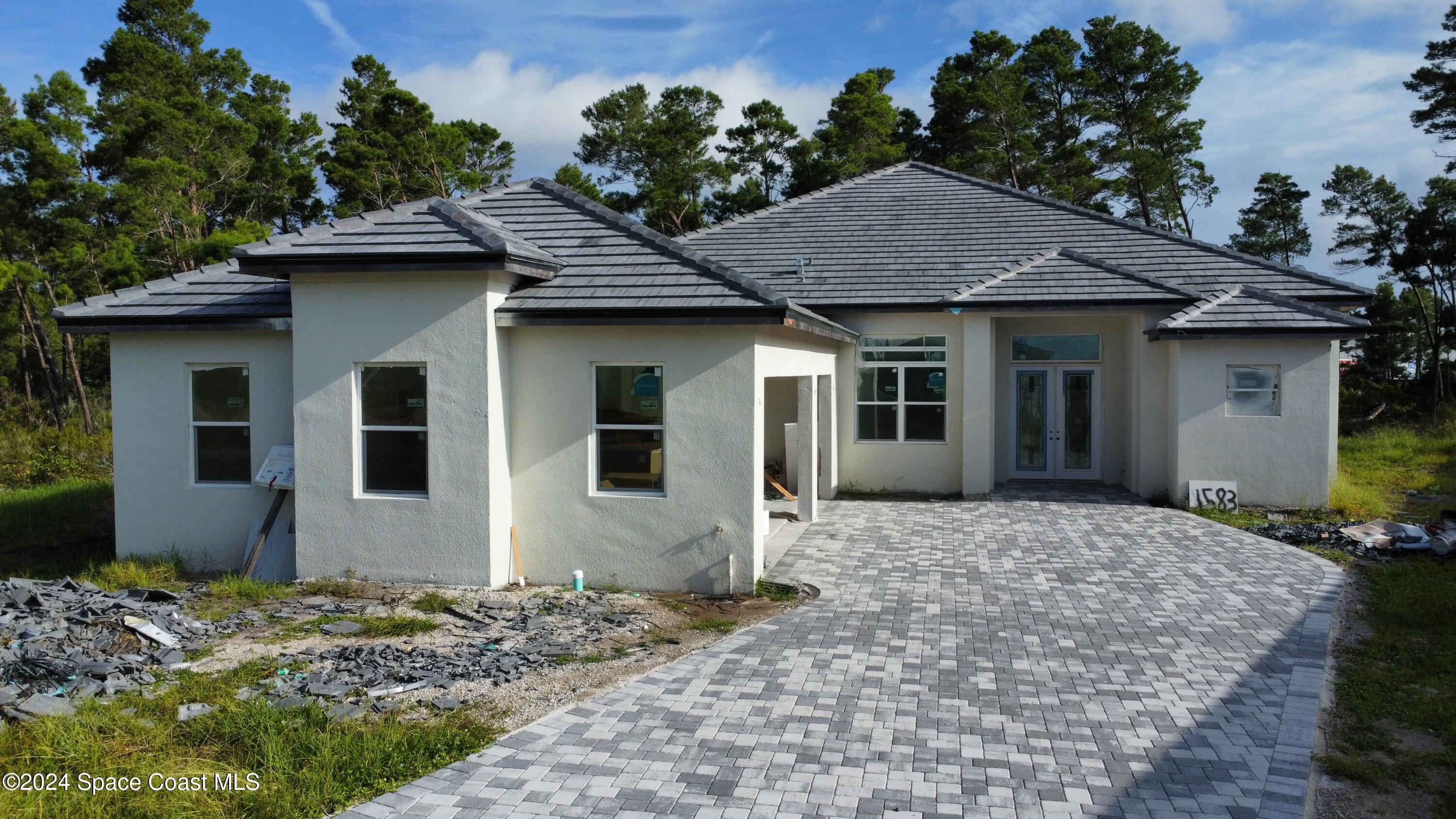 a view of a house with a patio