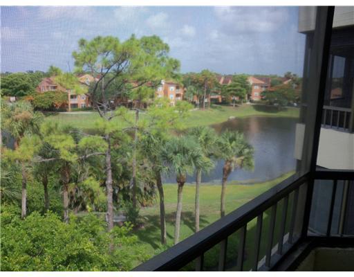 a view of a garden from a balcony