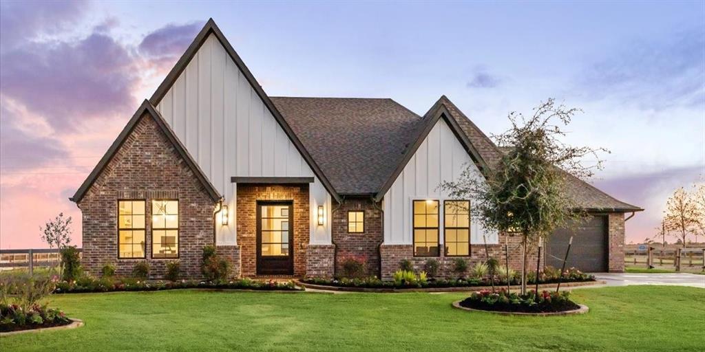 New construction by Jamestown Estate Homes in the acreage community Lakeview.  This home is located in Lakeview's gated section of custom homes, and it's situated on a 1 acre homesite.