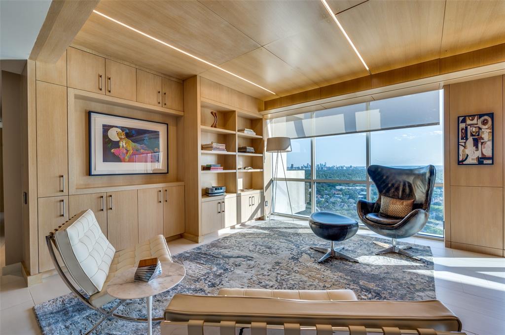 a view of a living room and kitchen