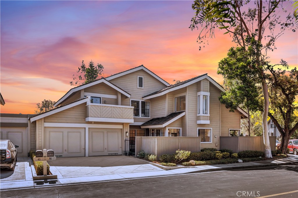 a front view of a house with a garage