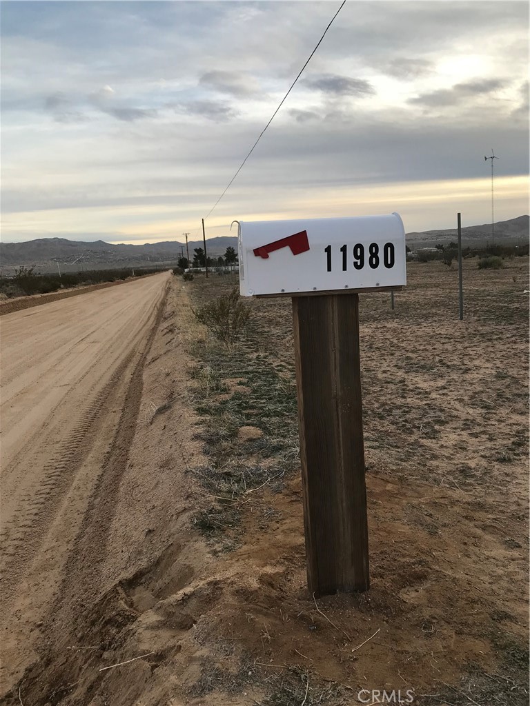 a sign board with an empty room