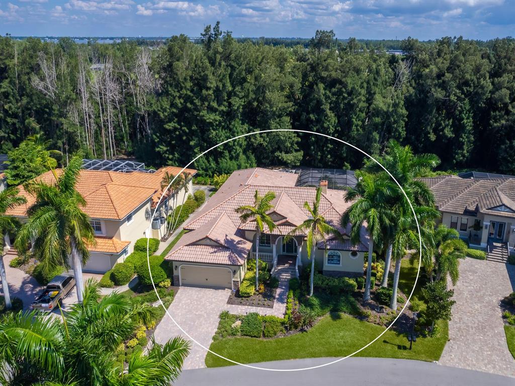 an aerial view of a house with a garden