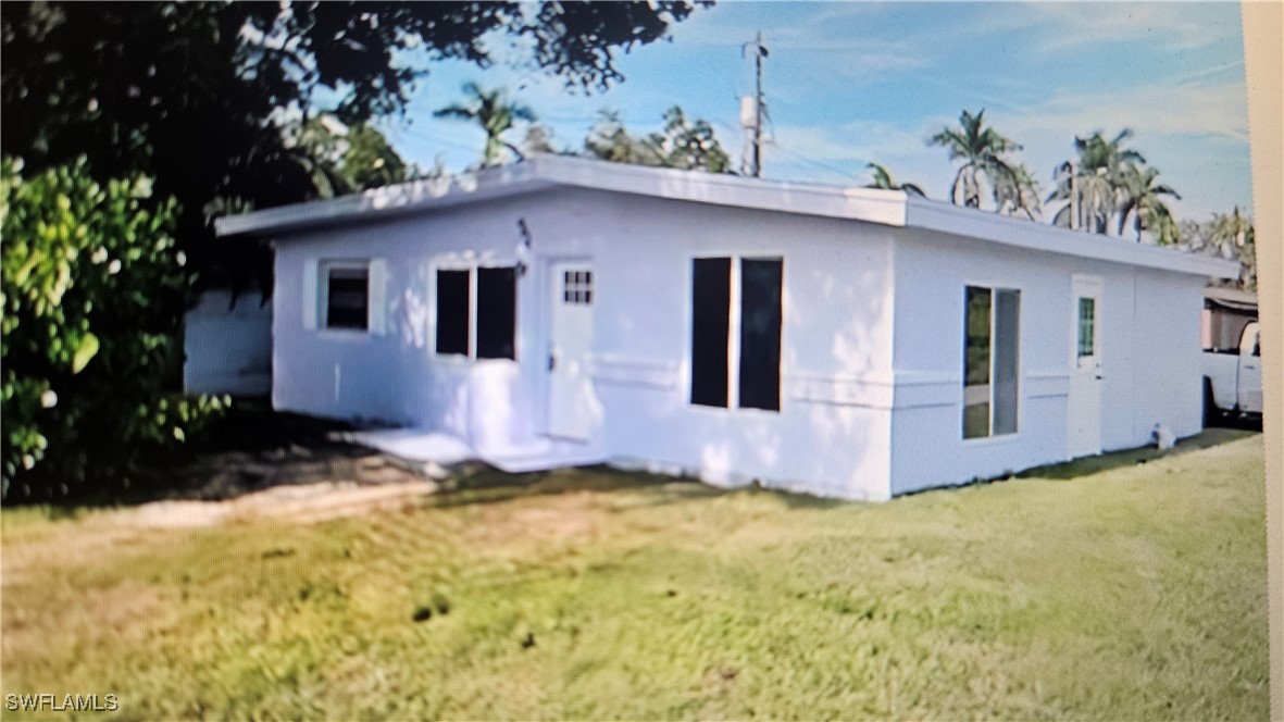 a front view of house with yard